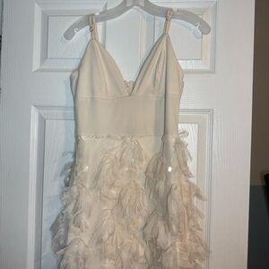 Elegant Cream Dress with Feather Details